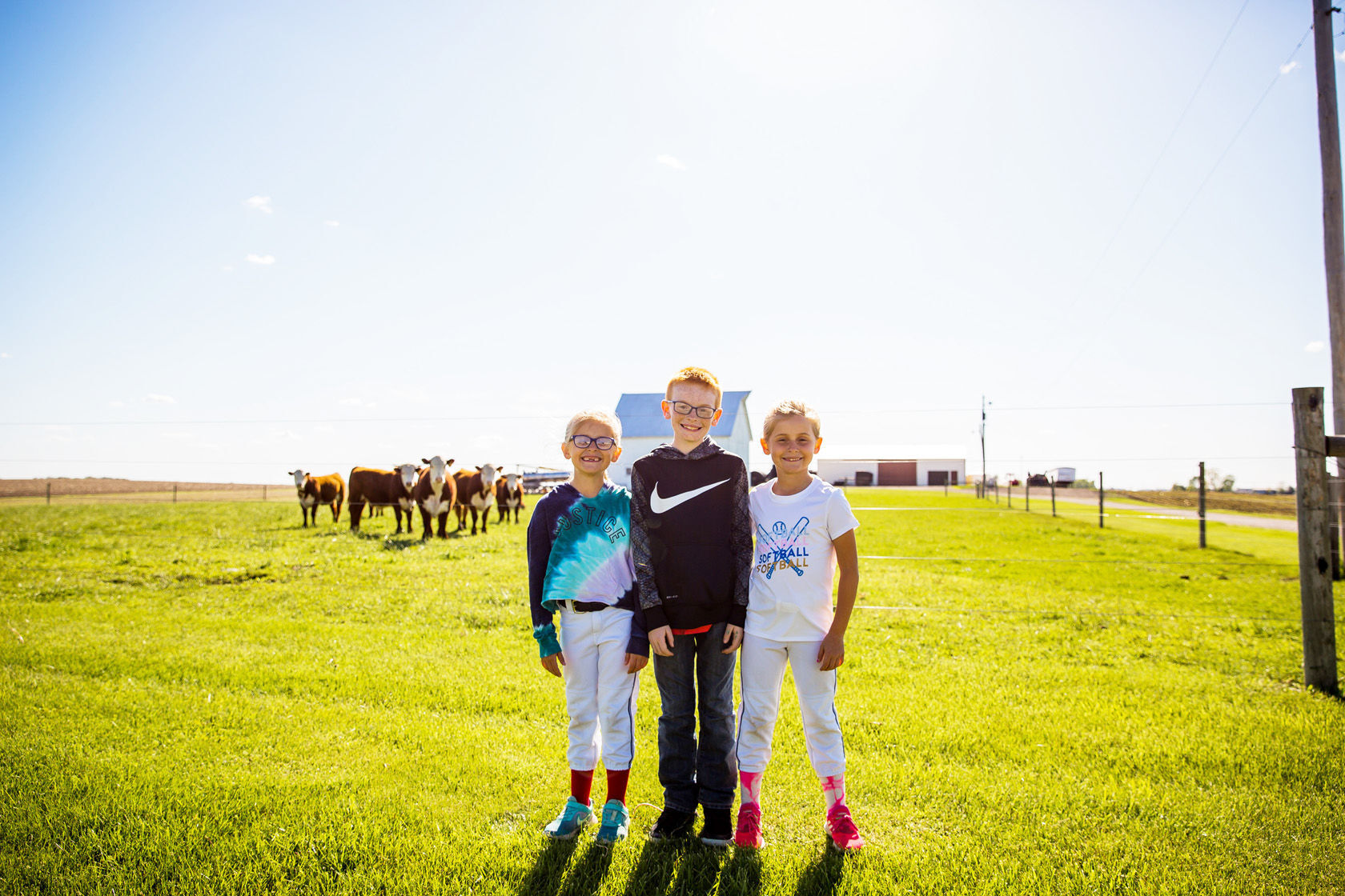 Kids and cows on the Wolken farm
